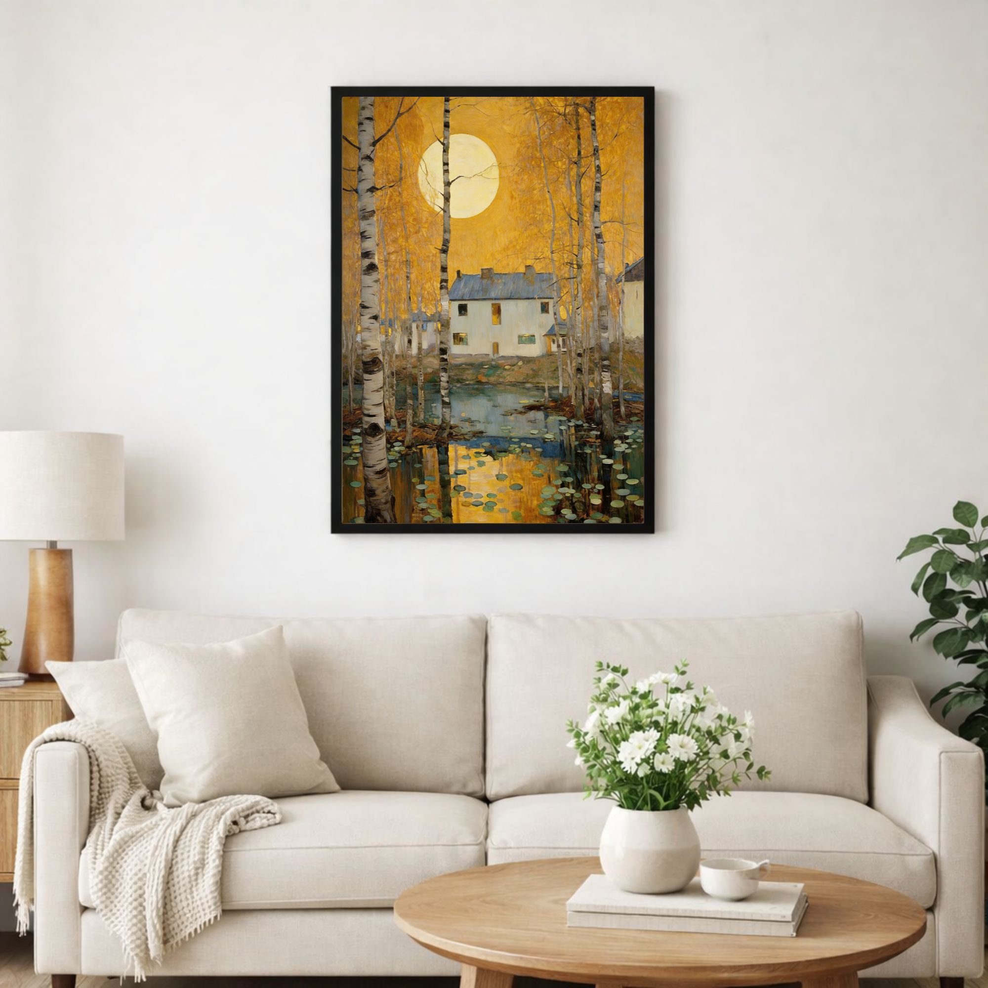 house-in-forest-art-in-a-black-frame-hanging-above-sofa
